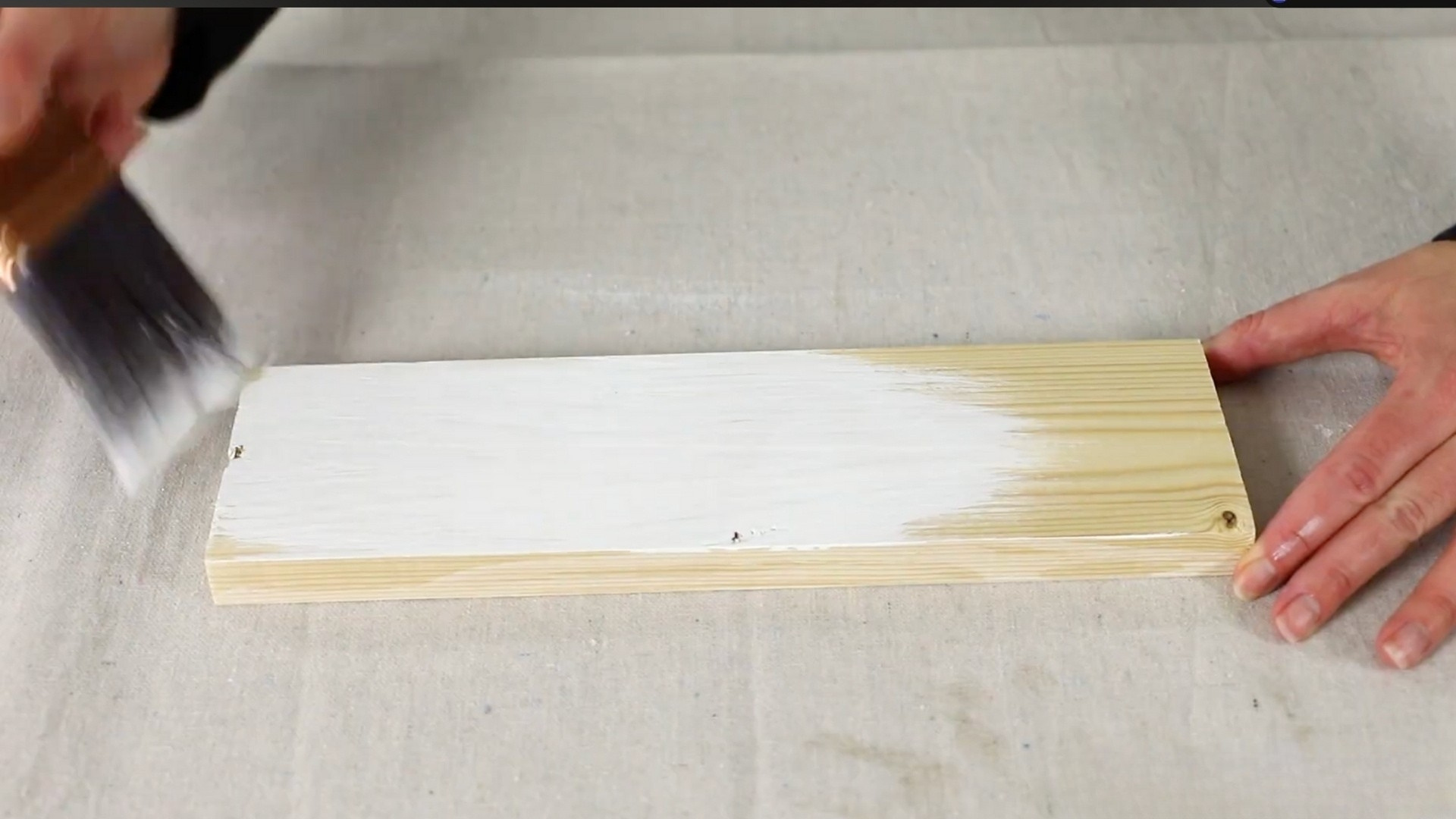 brush whitewash onto wood