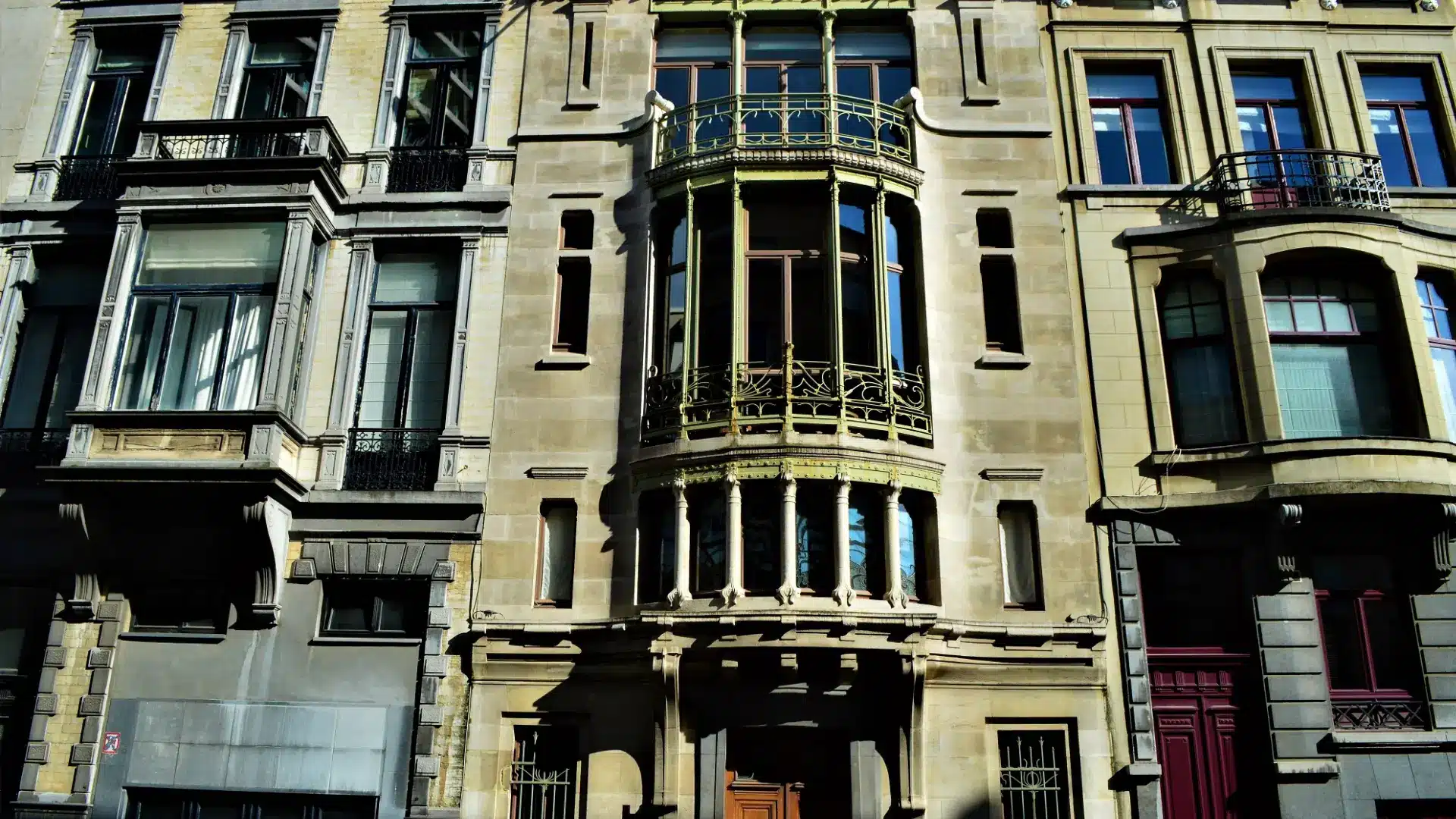 An architectural structure with a large clock, emphasizing its role as a time marker in the urban landscape