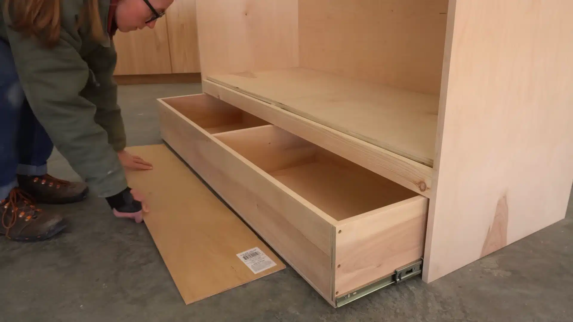 Installing drawer slides and fitting wooden drawer box inside Murphy bed cabinet base section
