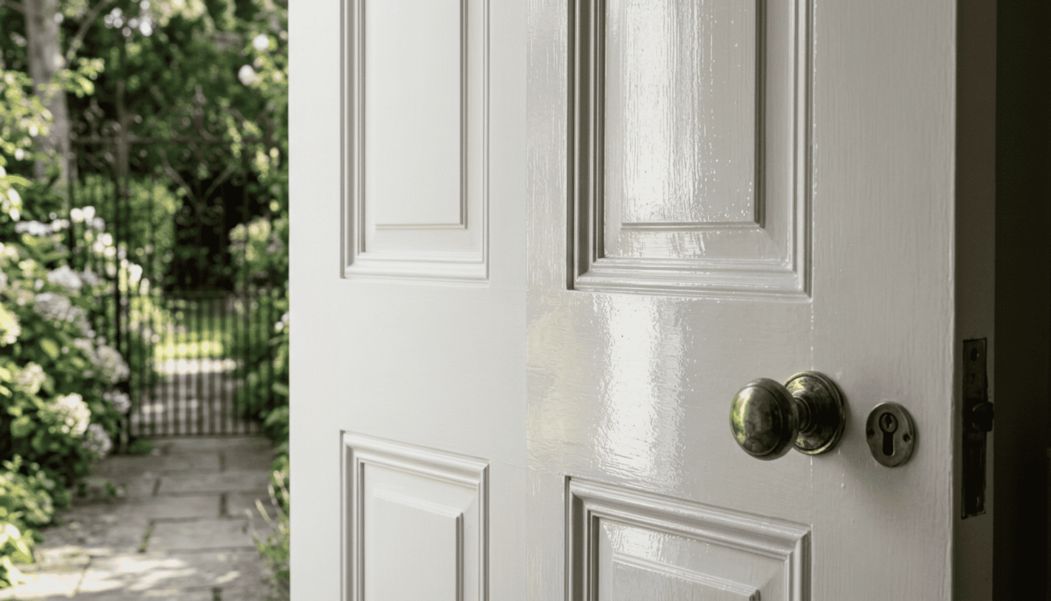 white paneled door with matte satin finish on left, glossy semi-gloss sheen on right